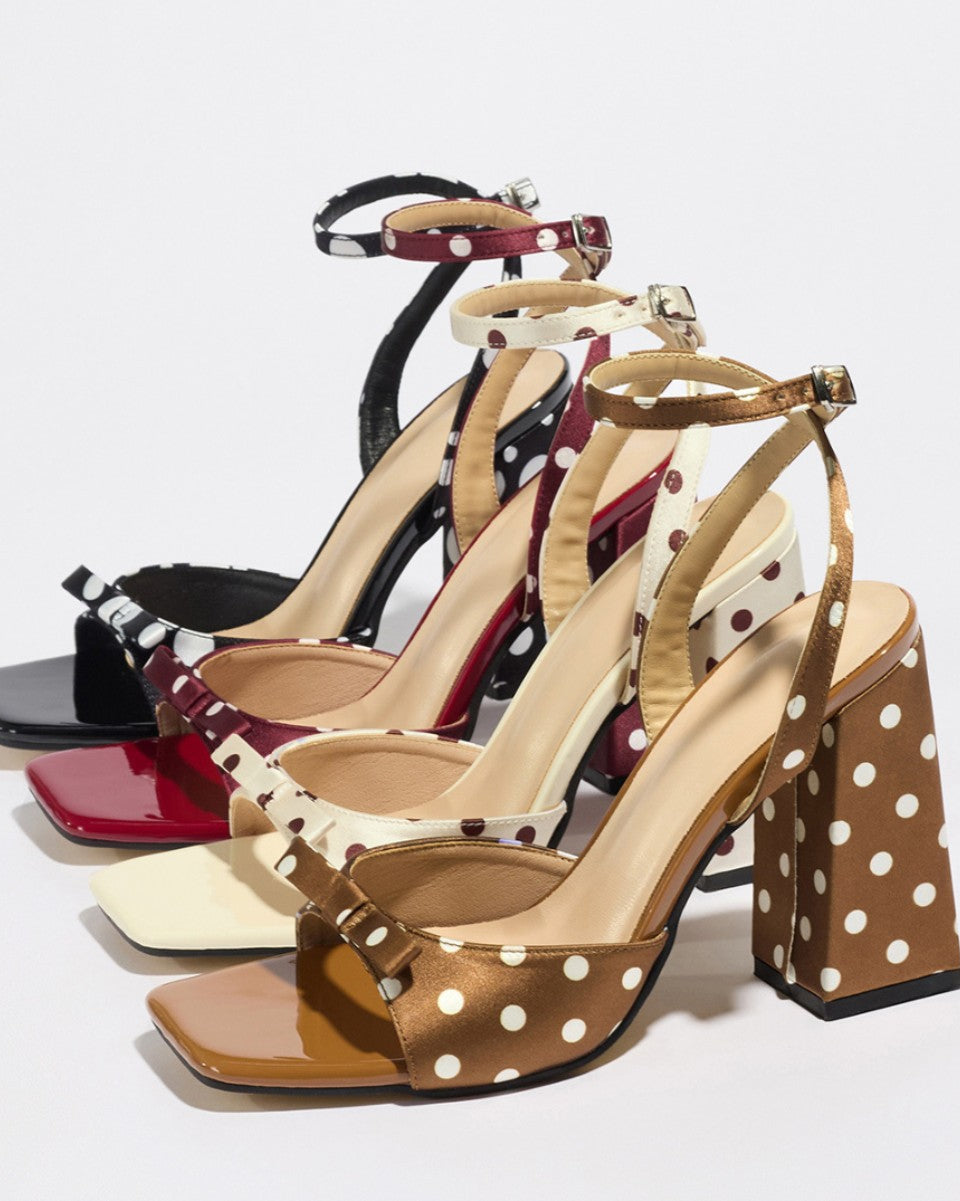 Mescini - Polka dot block heel sandals in four colors lined up, studio group view, US