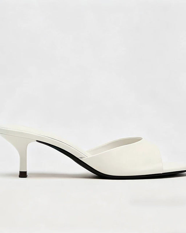 Mescini - White kitten heel mule from the side with the band over the foot, US sizes