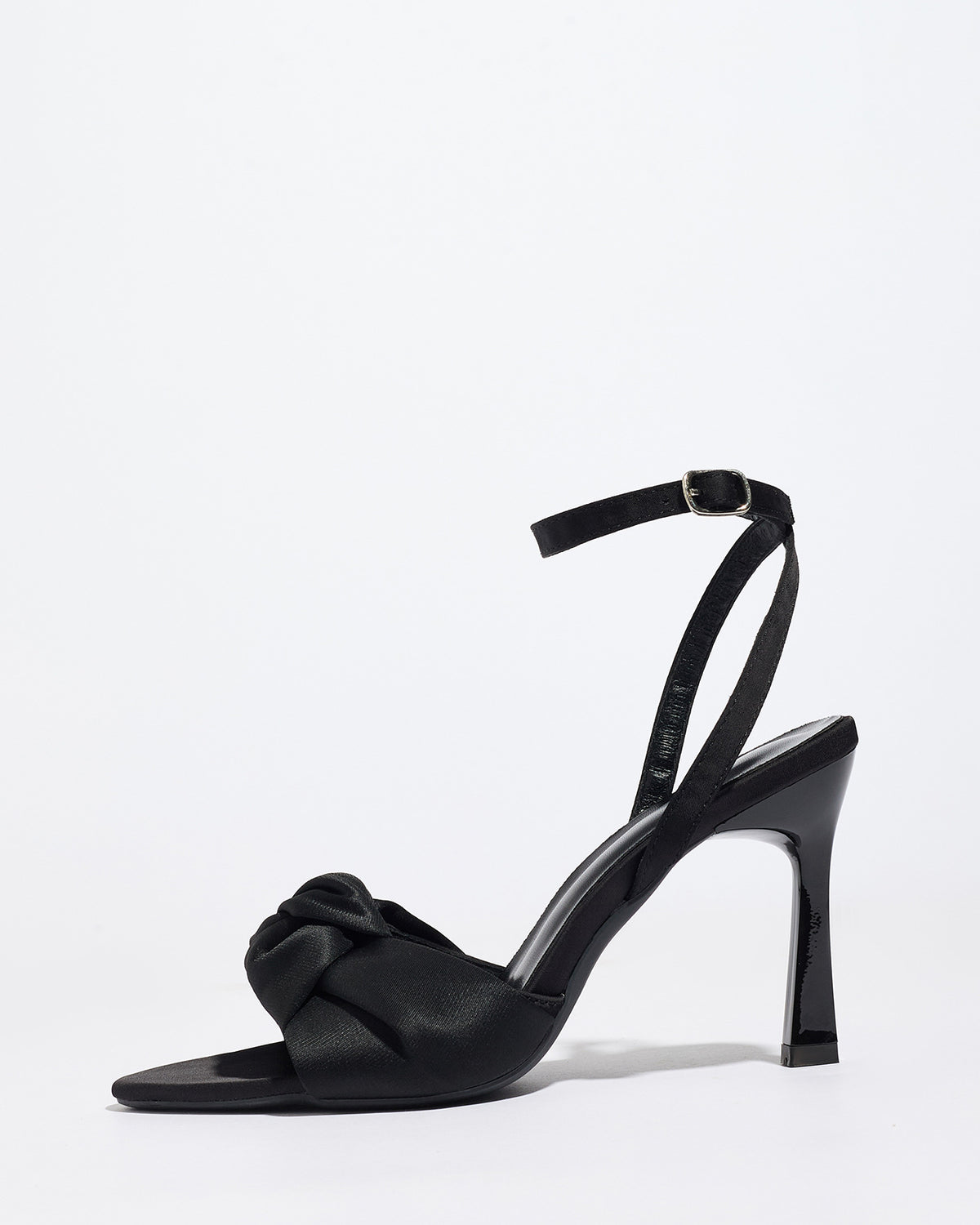 Mescini black knotted satin ankle strap sandals, single shoe in profile on white, US women's sizes