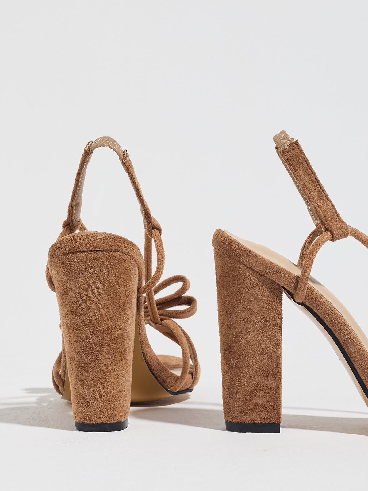 Mescini brown knotted bow strappy block heel sandals, seen from behind at an angle, US women's sizes