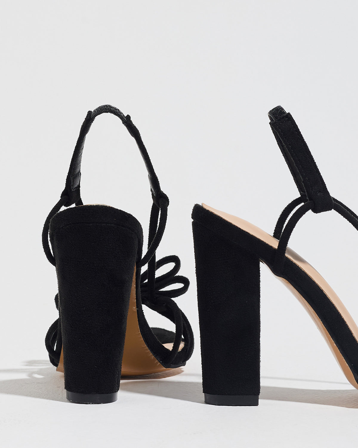 Mescini black knotted bow strappy block heel sandals, seen from behind at an angle, US women's sizes