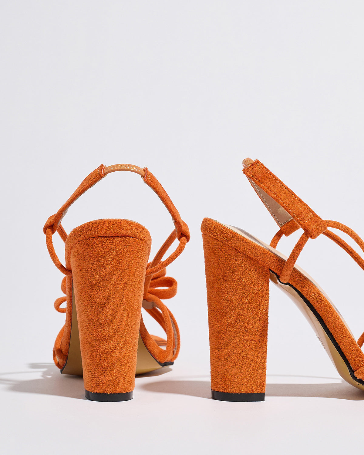 Mescini orange knotted bow strappy block heel sandals, seen from behind at an angle, US women's sizes