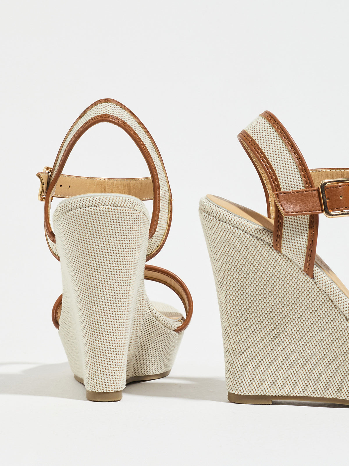 Mescini brown canvas platform wedge sandals, seen from behind at an angle, US women's sizes