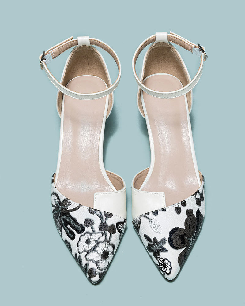 Mescini white embroidered floral ankle strap pumps, pair seen from directly above, US women's sizes