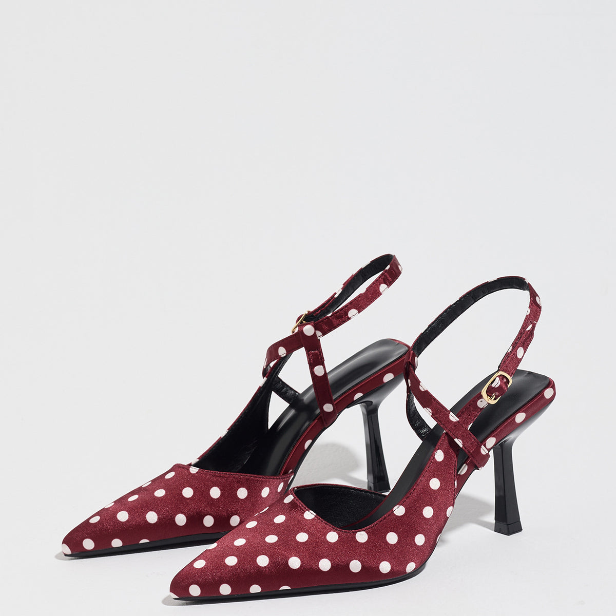 Mescini burgundy polka dot pointed toe slingback heels, angled pair on white, US women's sizes