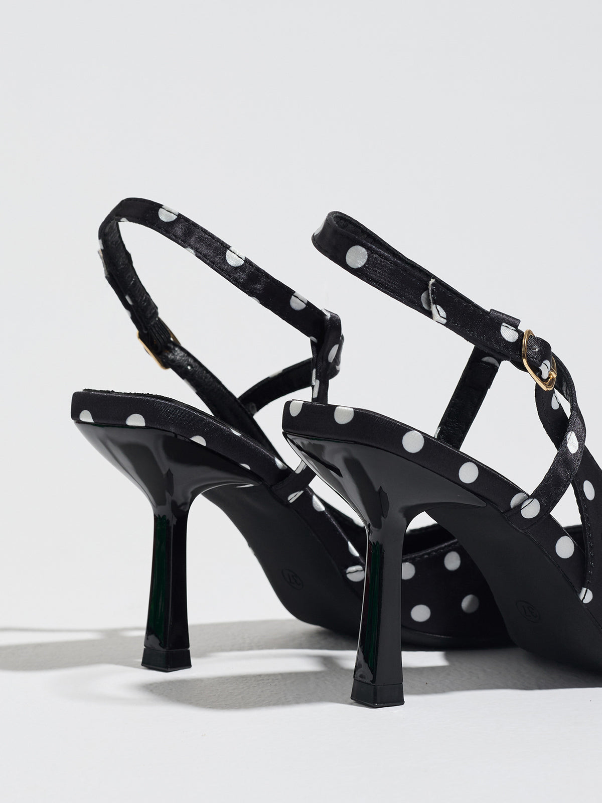 Mescini black polka dot slingback heels, rear view of the standing pair, US women's sizes