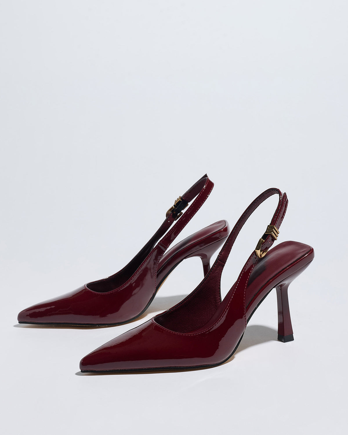 Mescini – Burgundy patent slingback pumps, angled studio pair on white, US women's sizes