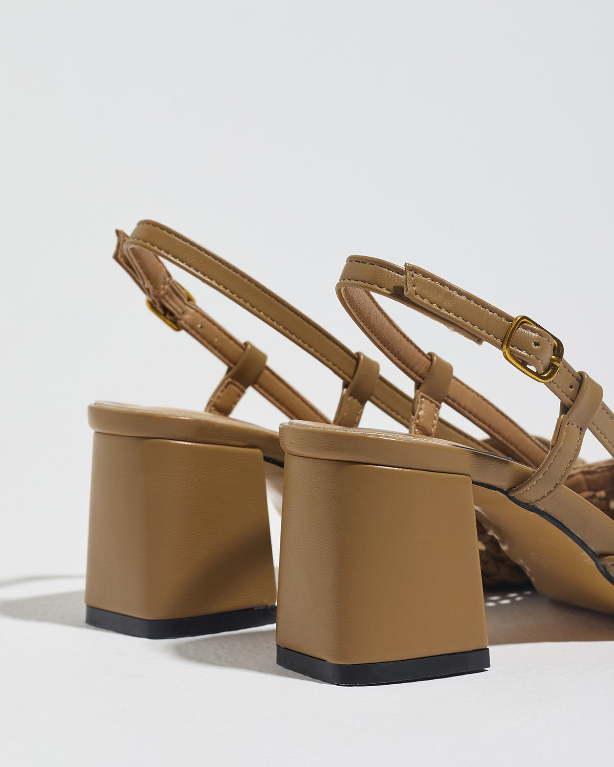 Mescini brown woven pointed toe pumps, rear view of the two block heels, US women's sizes