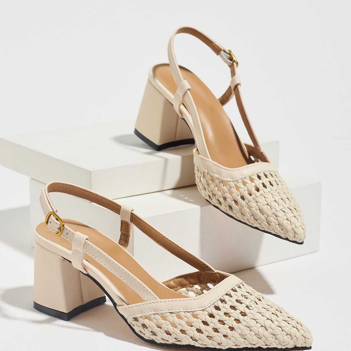 Mescini off-white woven pointed toe block heel pumps, pair on white risers, US women's sizes