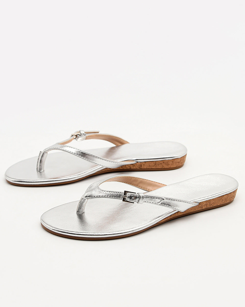 Mescini silver toe post low heel slide sandals, the pair angled on a white background, US women's sizes