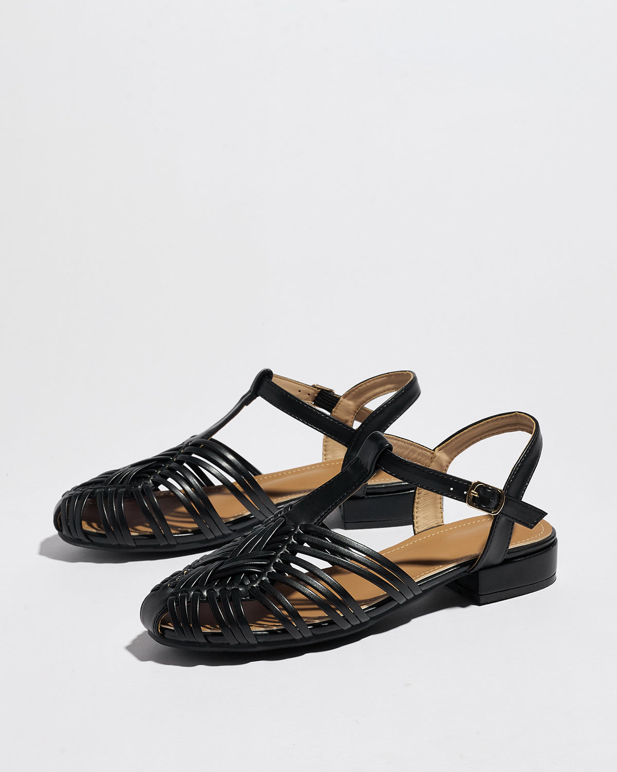 Mescini black woven closed toe block heel sandals, pair angled and seen from above, US women's sizes
