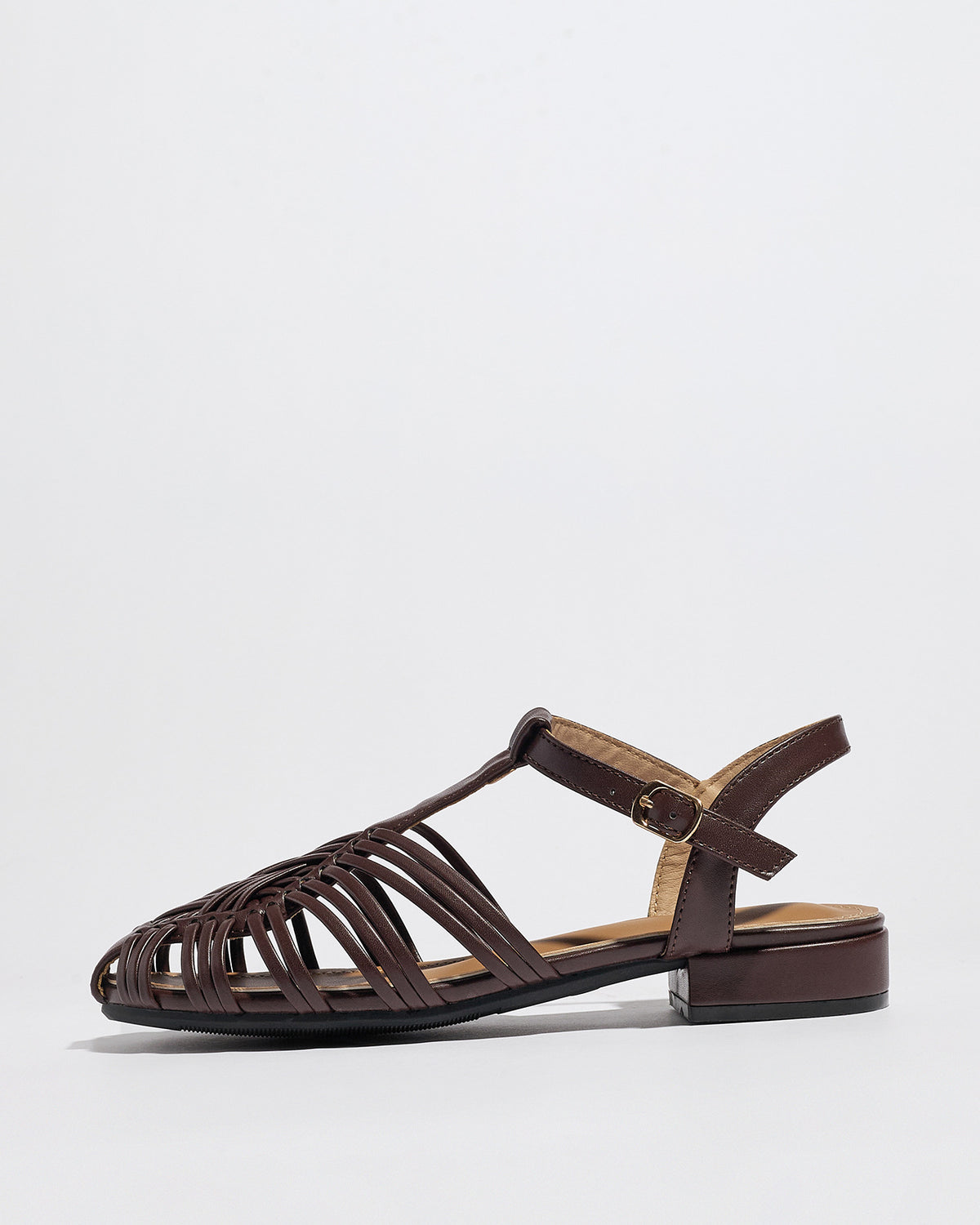 Mescini brown woven closed toe block heel sandals, single shoe seen from the side, US women's sizes