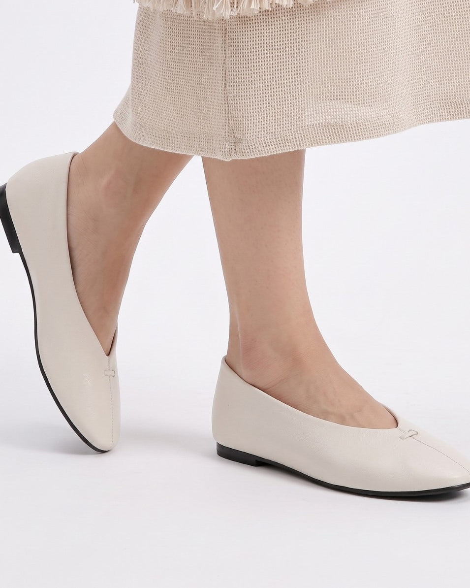Mescini - off-white ballet flats worn, seam running to the toe, US women's sizes