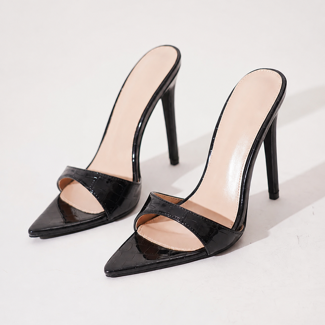 Mescini black croc embossed pointed stiletto mules, the pair angled on a pale grey backdrop, US women's sizes