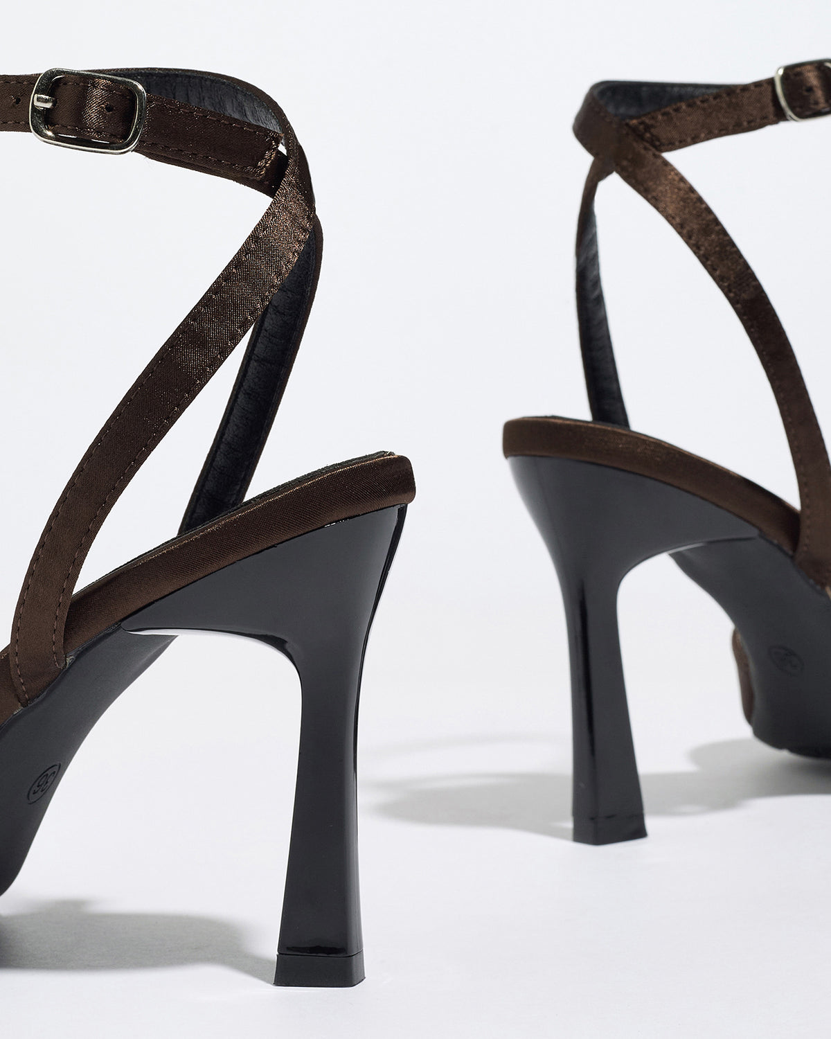Mescini brown satin bow ankle strap sandals, rear view of the pair, heels turned outward, US women's sizes