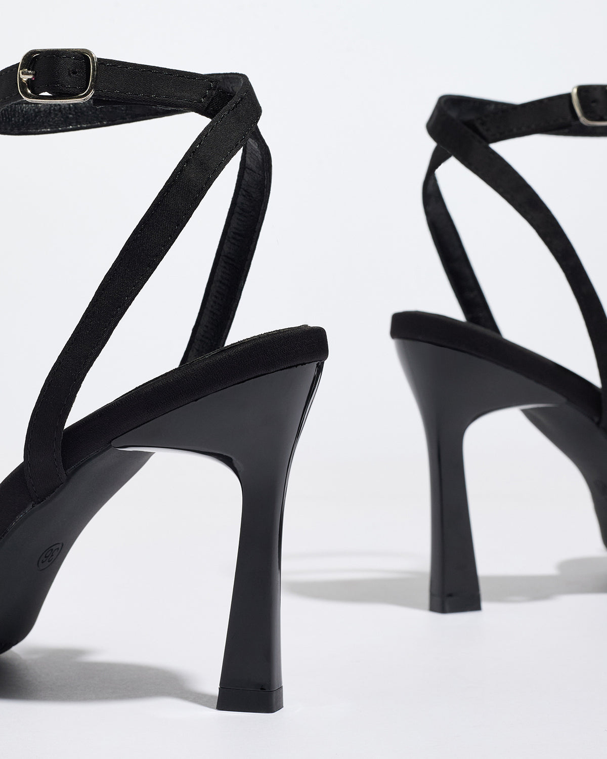 Mescini black satin bow ankle strap sandals, rear view of the pair showing the heels, US women's sizes