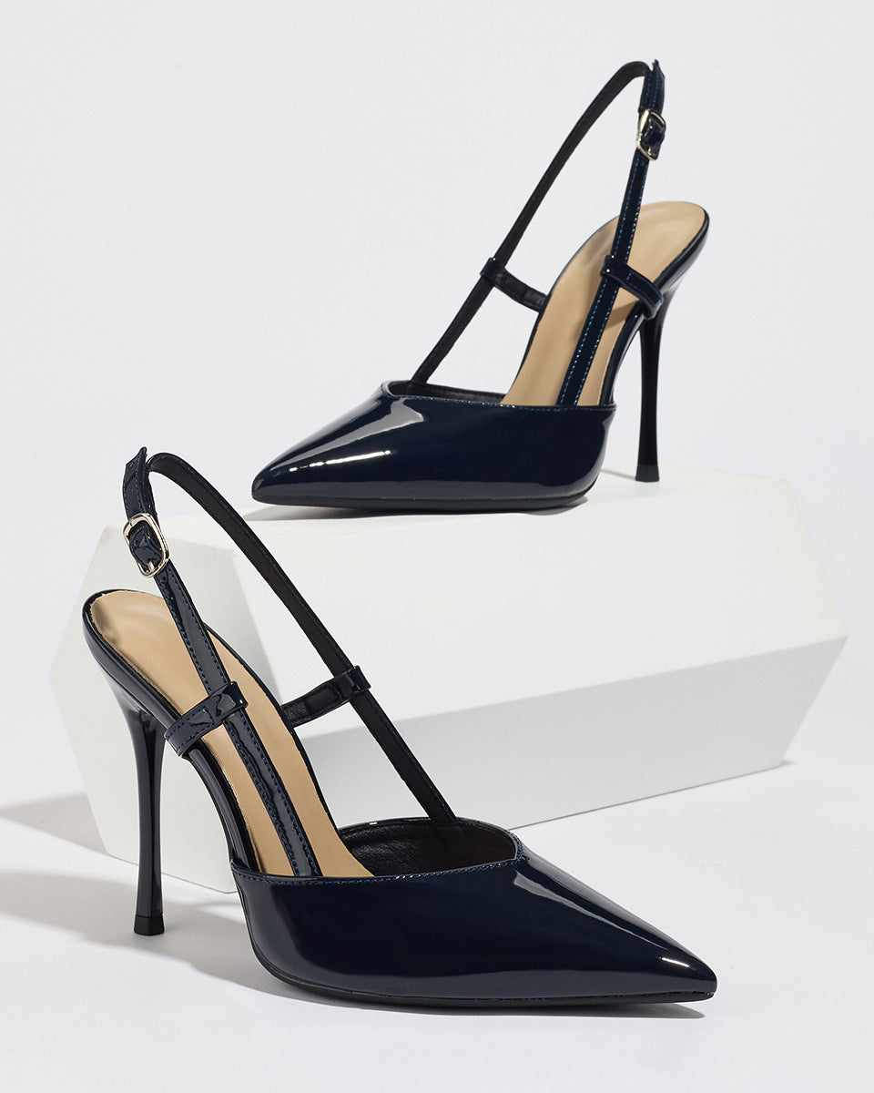 Mescini black patent pointed toe slingback heels, angled pair on a white block, US women's sizes