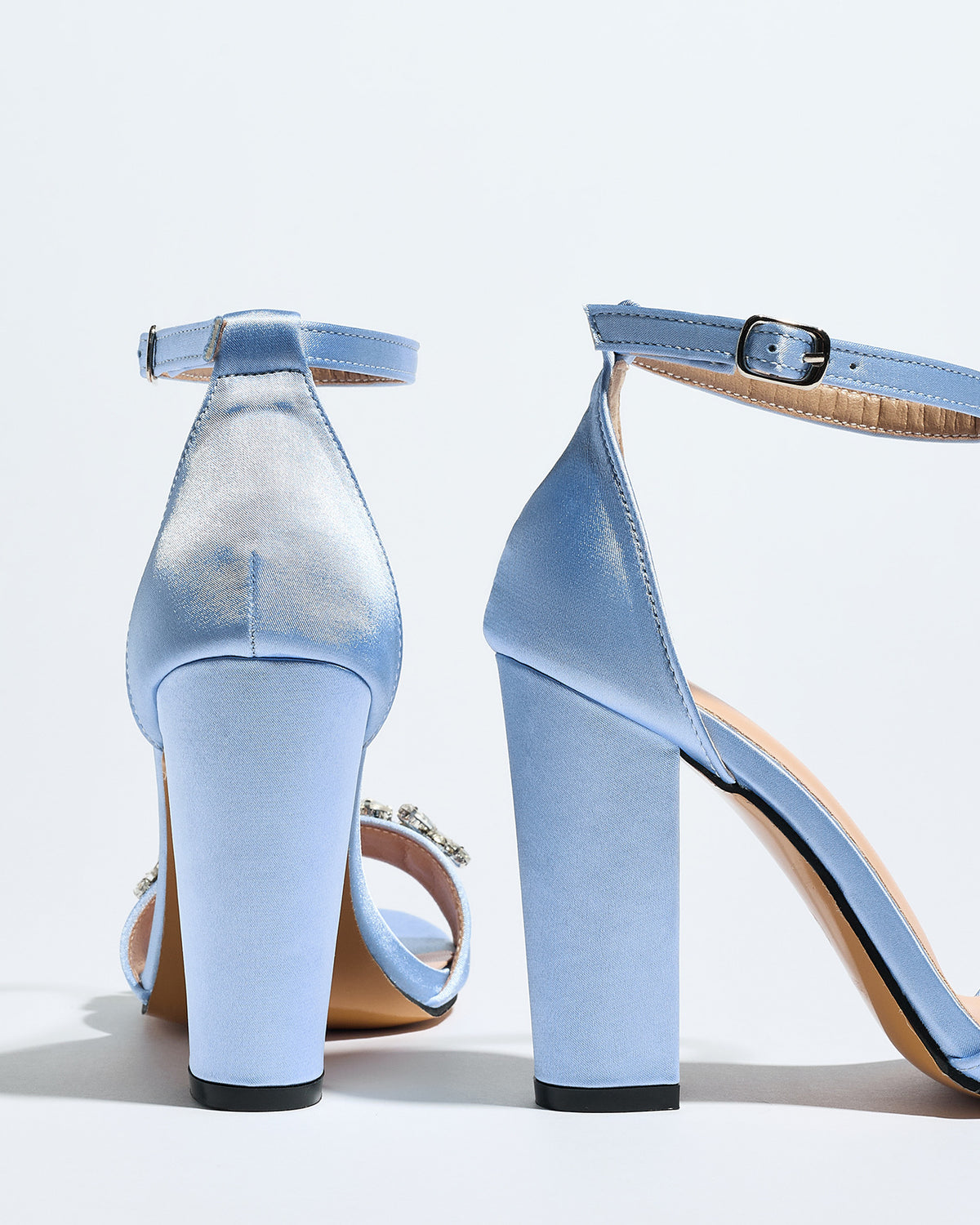 Mescini light blue crystal strap block heel sandals, seen from behind on white, US women's sizes