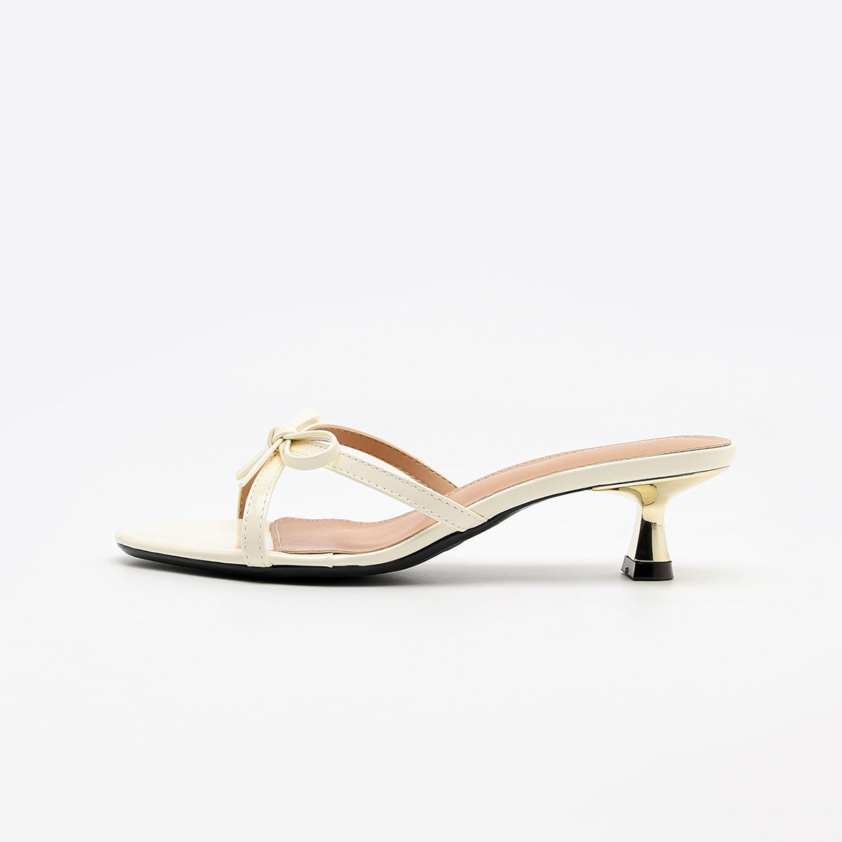 Mescini white bow open toe kitten heel mules, single shoe in full side view, US women's sizes