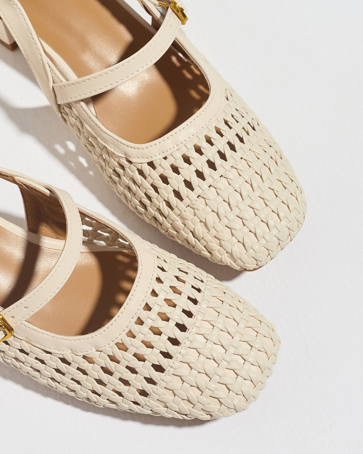 Mescini white woven square toe mary jane heels, close crop of the buckle straps, US women's sizes