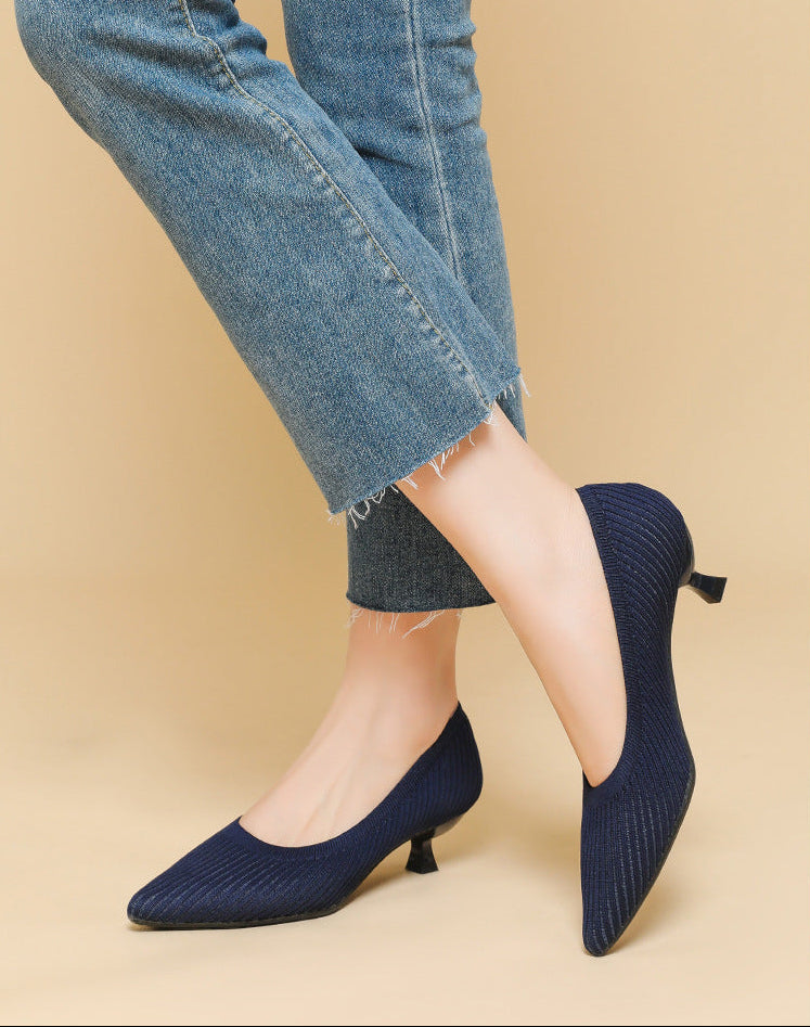 Mescini navy knit pointed toe kitten heel pumps, worn standing with cropped jeans, US women's sizes