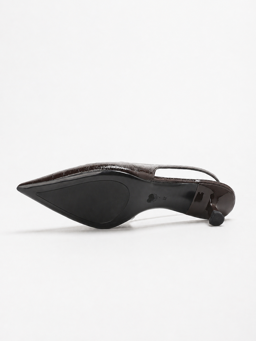 Mescini brown pointed toe slingback kitten heels, underside of a single shoe, US women's sizes