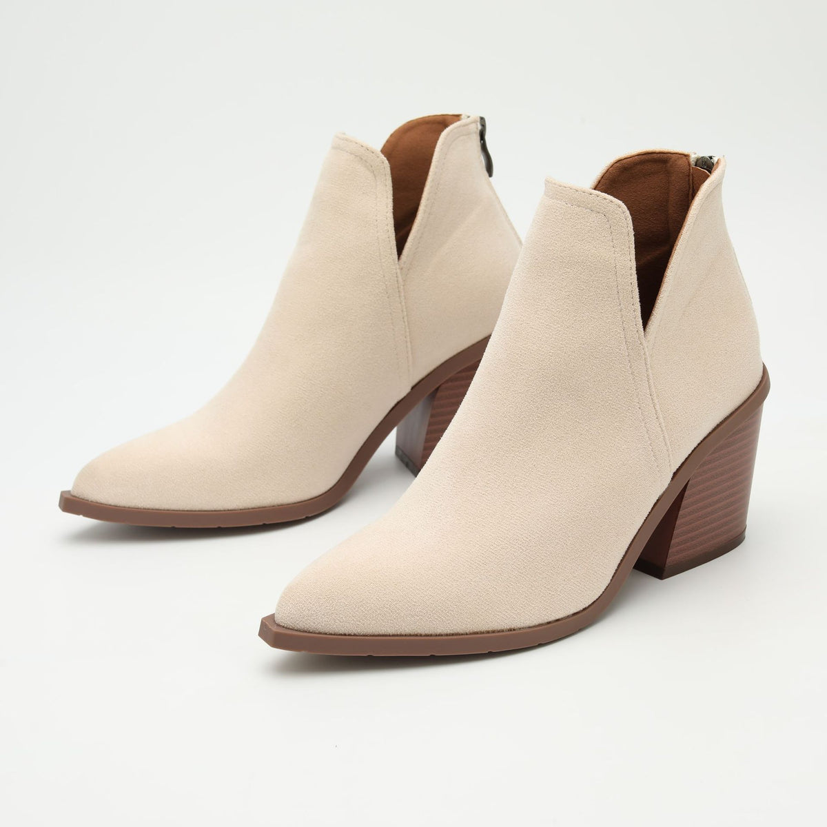 Mescini – cream pointed toe ankle boots standing pair, front angle, US women's sizes