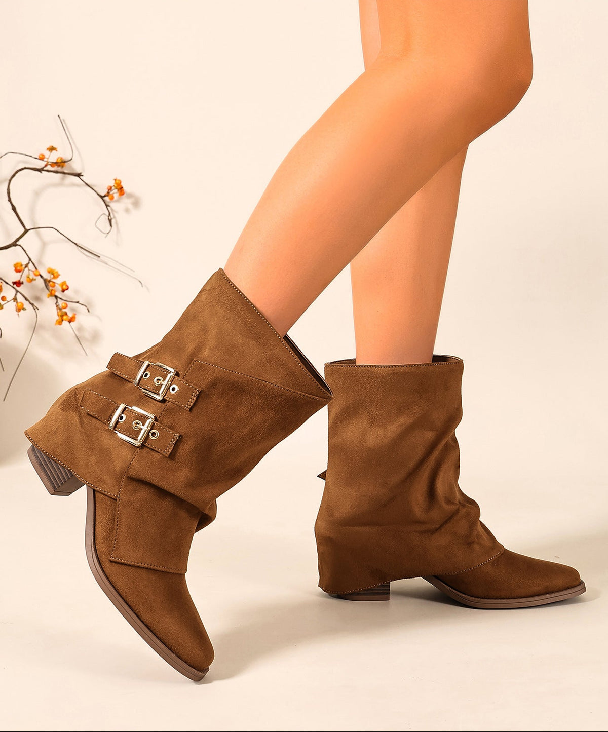 Mescini brown ruched buckle mid calf slouch boots worn standing, both feet, US women's sizes