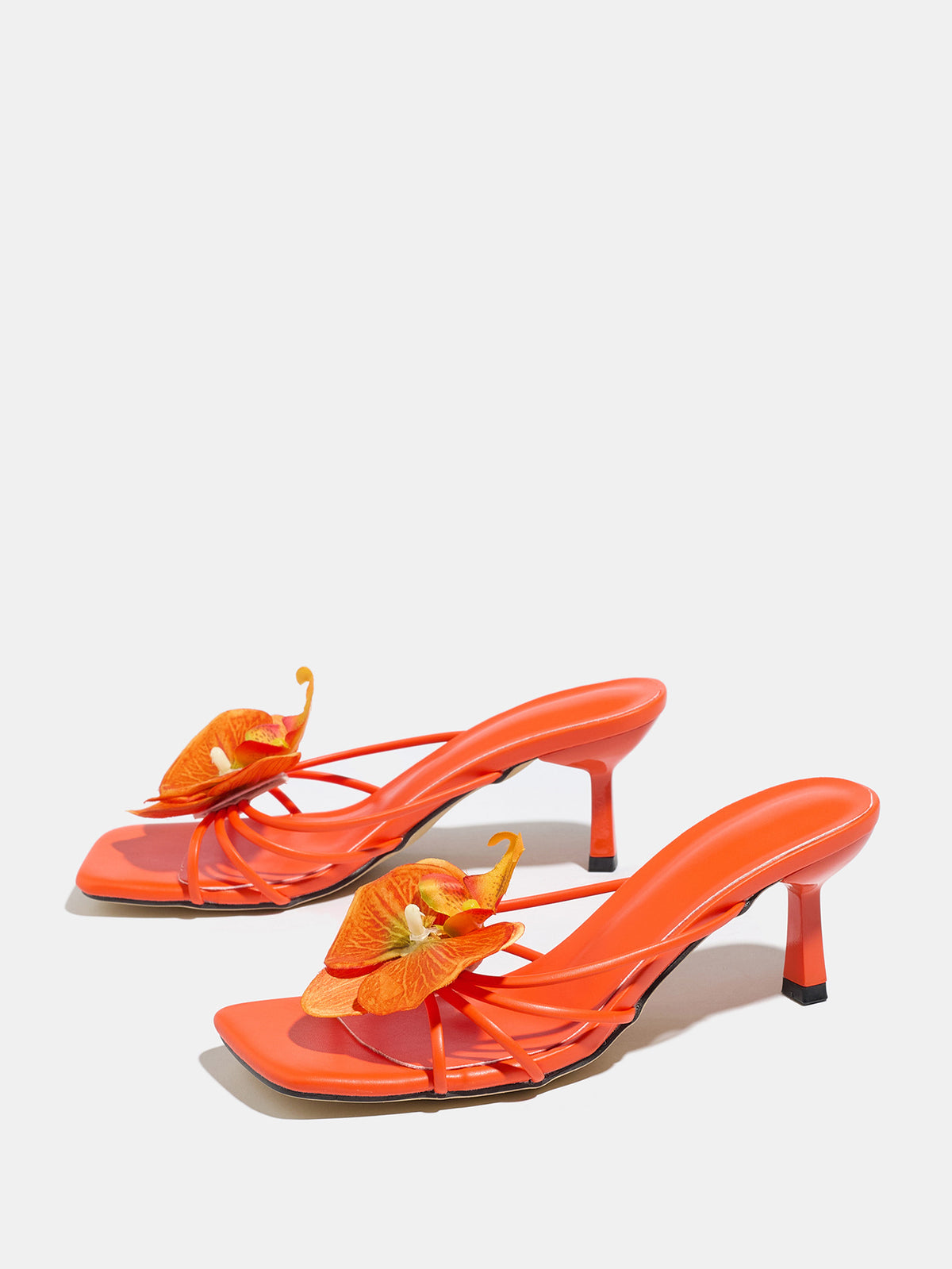Mescini apricot square toe heeled mule sandals, angled pair on a grey floor, US women's sizes