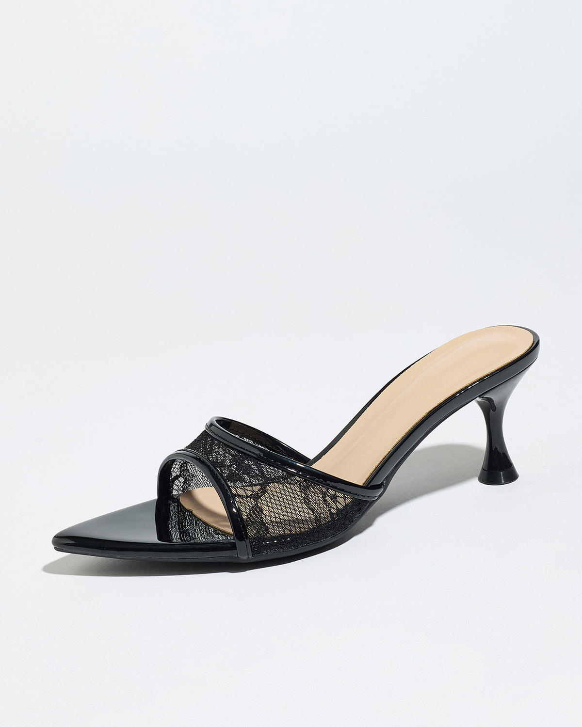 Mescini black sheer lace pointed toe mule heels, single shoe seen from the side, US women's sizes