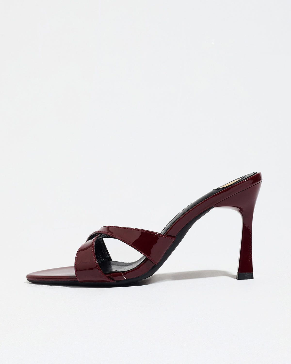 Mescini burgundy cross strap stiletto mule sandals, single shoe side profile, US women's sizes