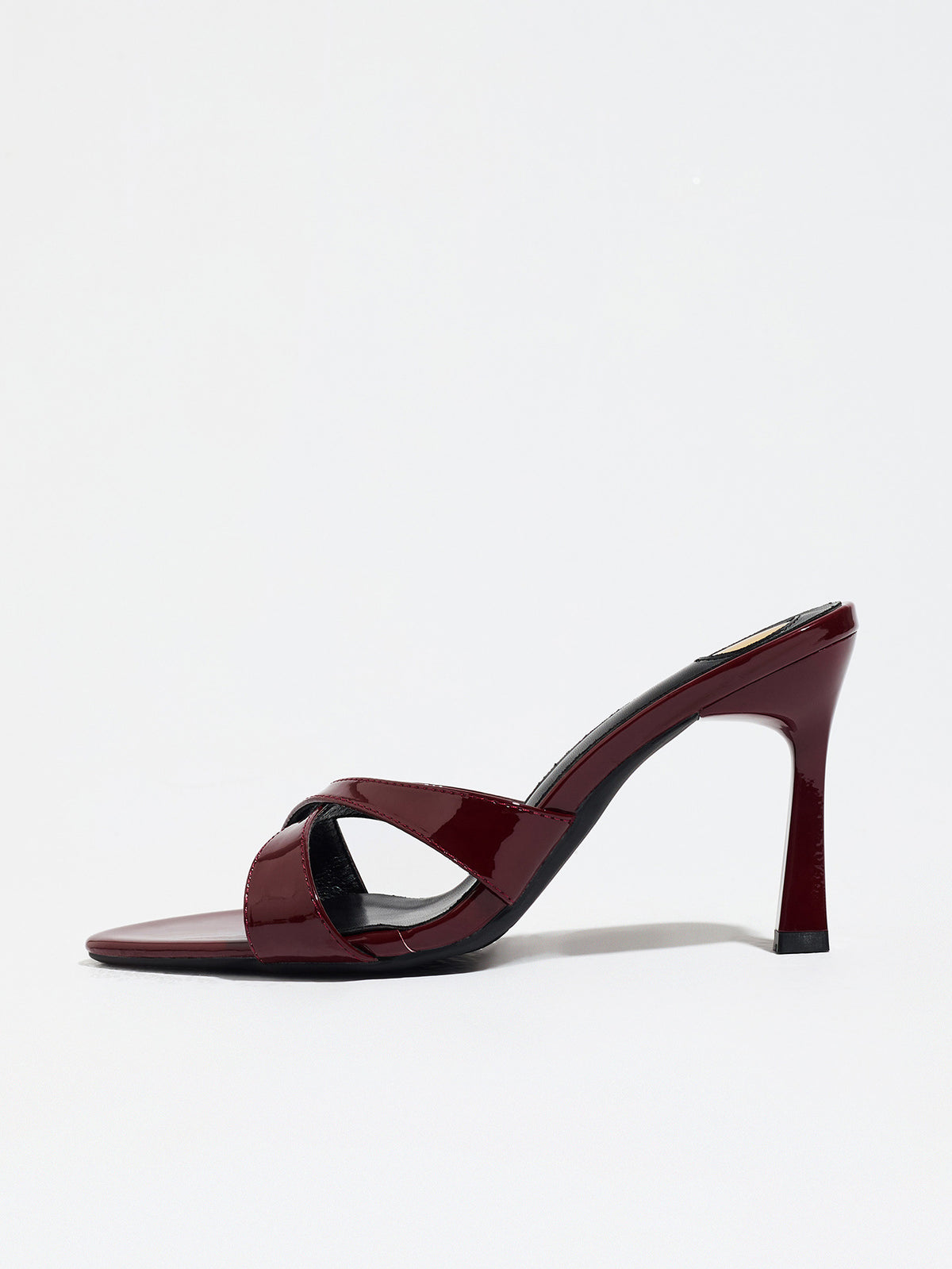 Mescini burgundy cross strap stiletto mule sandals, single shoe side profile, US women's sizes