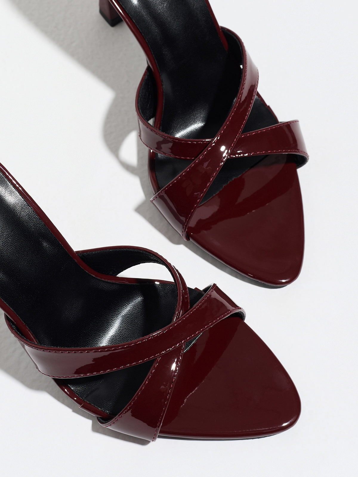 Mescini burgundy cross strap stiletto mule sandals, close up of toe and straps, US women's sizes