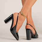 Mescini – black slingback pumps showing the elastic sling strap and heel, US women's sizes