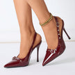 Mescini - Burgundy stiletto heels on the foot with the studded sling in view, US women's sizes