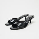 Mescini - Black square toe kitten heel mules as a pair, three quarter studio view, US sizes