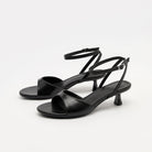 Mescini - Black ankle strap kitten heel sandals pair seen from the front angle, US women's sizes