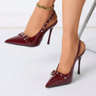Mescini - Burgundy stiletto heels worn on both feet at a front angle, US women's sizes