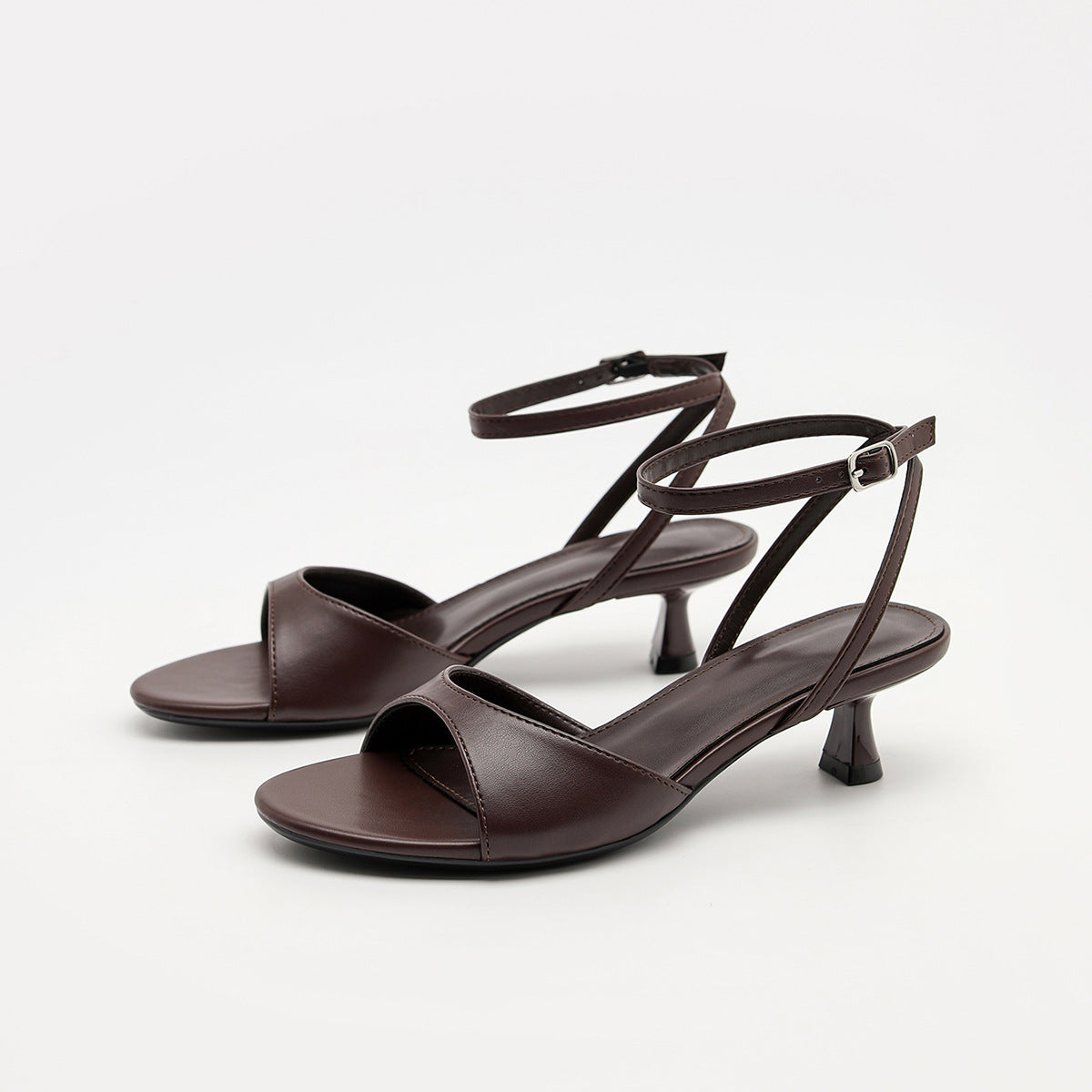 Mescini - Brown ankle strap kitten heel sandals pair at a three quarter angle, US women's sizes