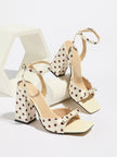 Mescini - Cream polka dot block heel sandal pair on a white riser, studio view, US sizes