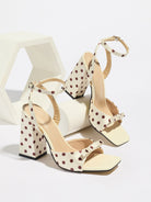 Mescini - Cream polka dot block heel sandal pair on a white riser, studio view, US sizes