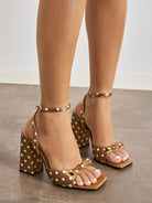 Mescini - Brown polka dot block heel sandals worn on tile, front on foot view, US sizes