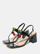 Mescini - Black block heel sandal pair seen from above on grey, flat lay view, US sizes