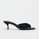 Mescini - Black kitten heel mule seen from the side, low flared heel view, US sizes