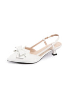 Mescini white bow pointed toe slingback kitten heels, single shoe seen from the side, US women's sizes