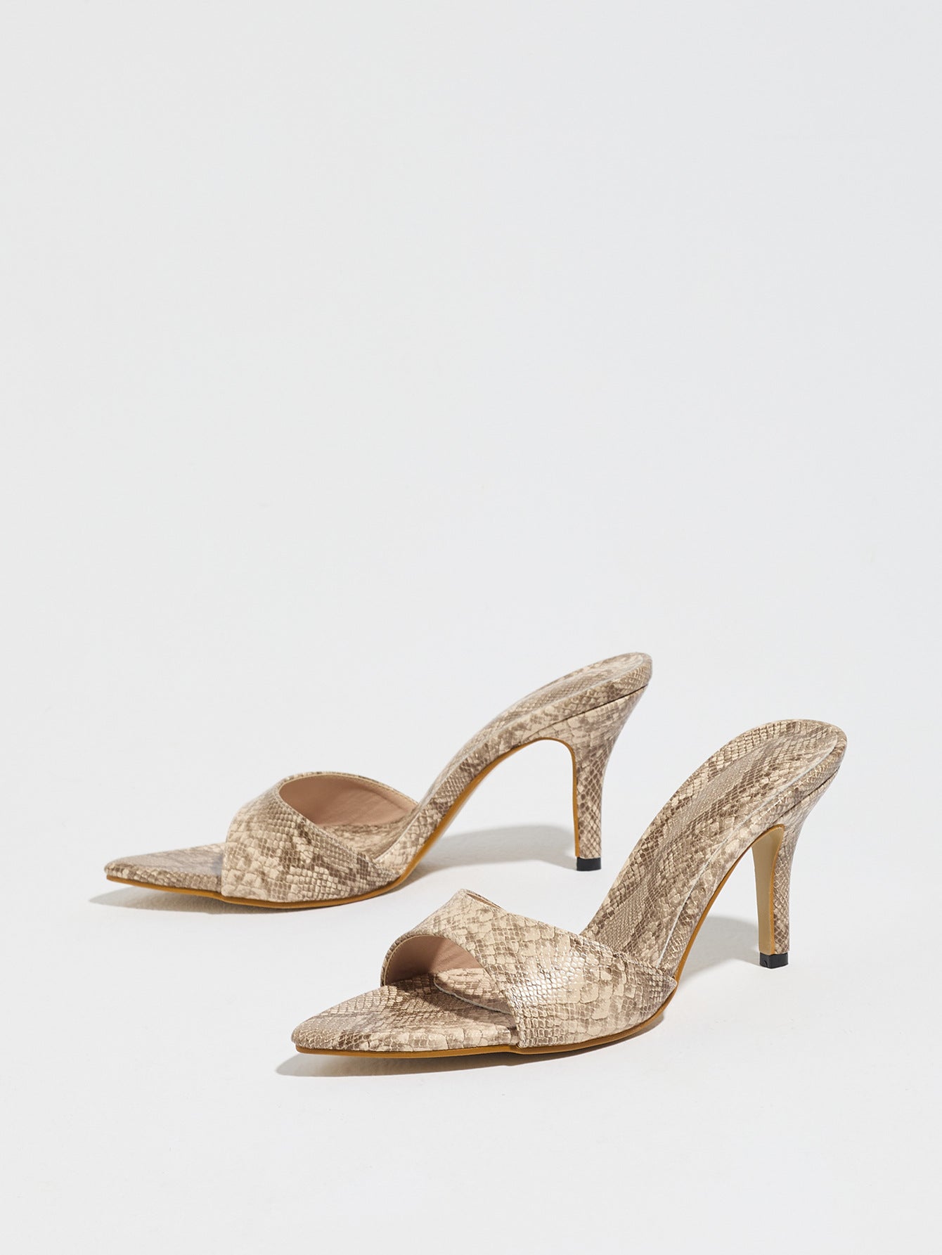 Mescini apricot snake print pointed toe mule heels, low angle view of both shoes, US women's sizes