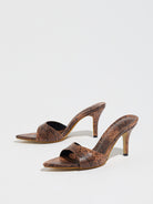 Mescini brown snake print pointed toe mule heels, low angle view of both shoes, US women's sizes