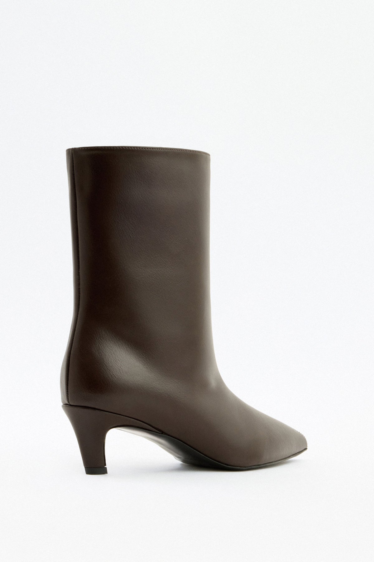 Mescini dark brown pointed toe ankle boots, side view of the curved heel, US sizes