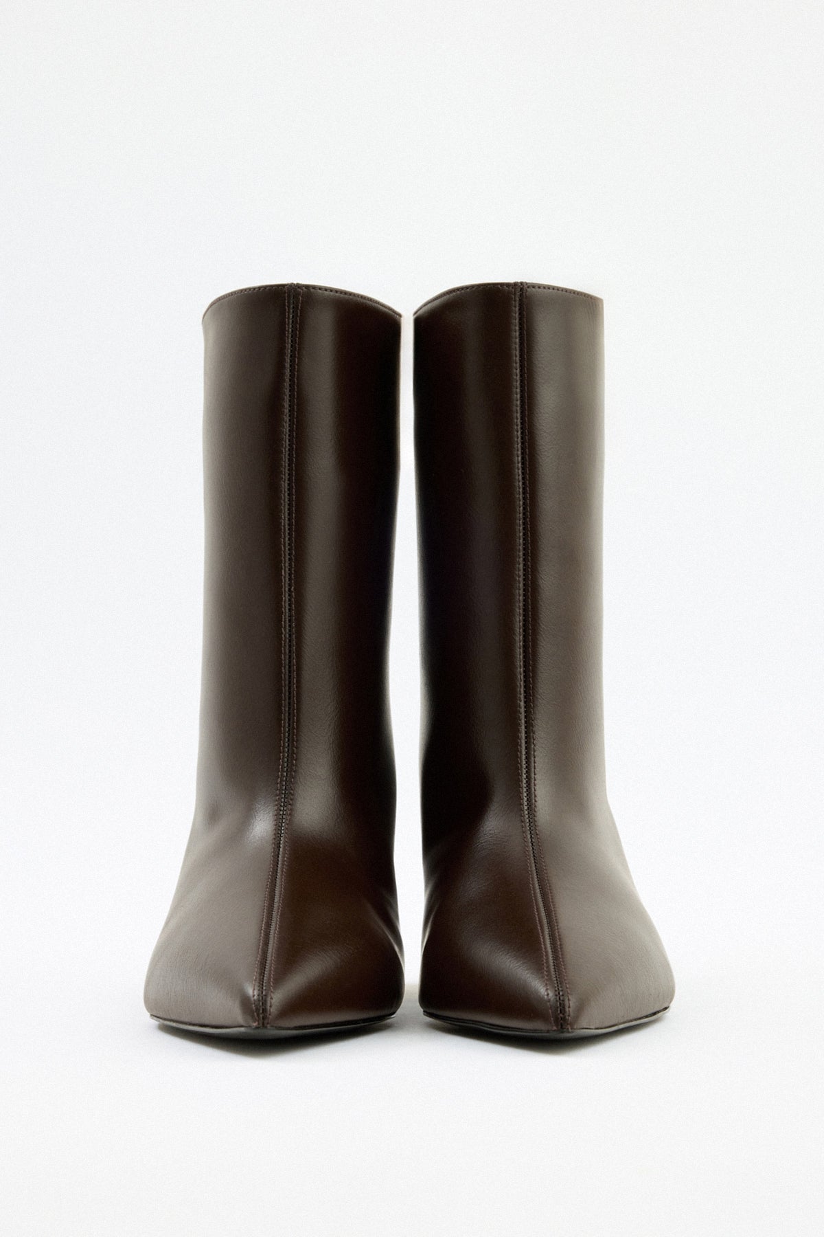 Mescini dark brown pointed toe ankle boots, front view with the seam centred, US sizes