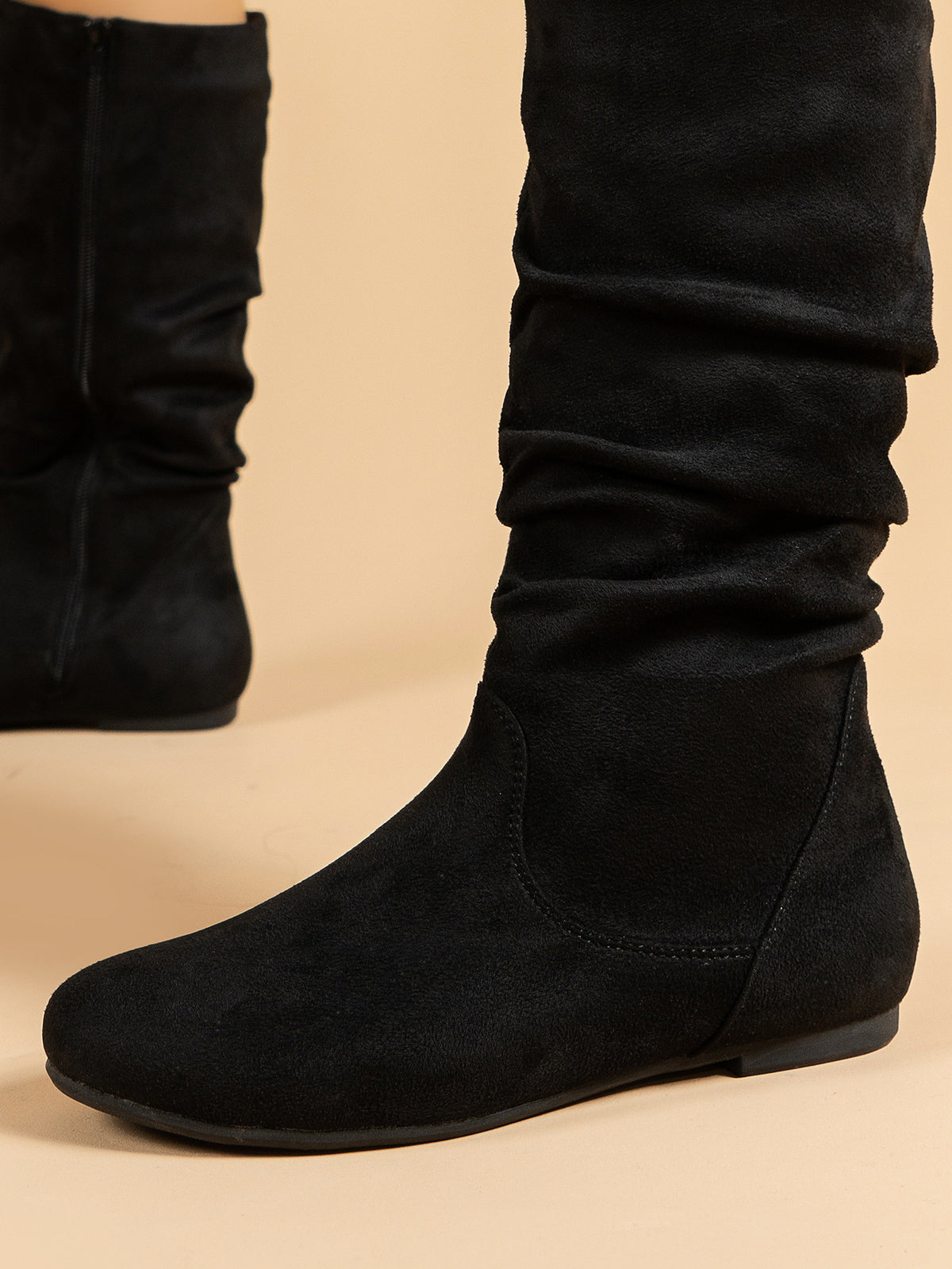 Mescini black pleated slouch flat mid calf boots, close up of the shaft and round toe, US women's sizes